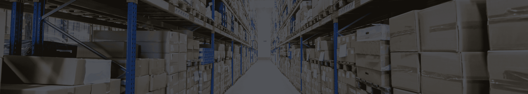 Inventory stacked in boxes inside a warehouse